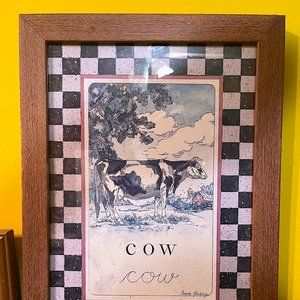 COW PRINT WITH CHECKERED BORDER IN WOODEN FRAME BY PAMELA GLADDING